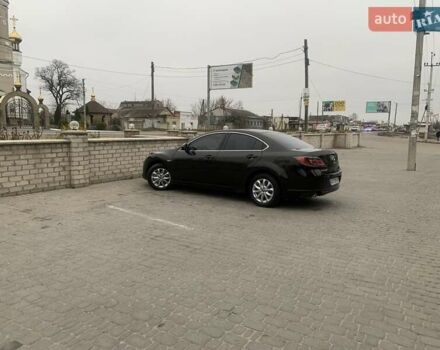 Черный Мазда 6, объемом двигателя 2.49 л и пробегом 230 тыс. км за 8000 $, фото 1 на Automoto.ua