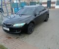 Черный Мазда 6, объемом двигателя 2 л и пробегом 270 тыс. км за 4600 $, фото 1 на Automoto.ua