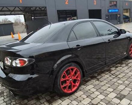 Черный Мазда 6, объемом двигателя 2.3 л и пробегом 270 тыс. км за 8000 $, фото 4 на Automoto.ua