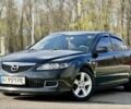Черный Мазда 6, объемом двигателя 2 л и пробегом 314 тыс. км за 5800 $, фото 1 на Automoto.ua