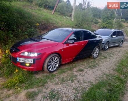 Черный Мазда 6, объемом двигателя 2.26 л и пробегом 200 тыс. км за 6800 $, фото 16 на Automoto.ua