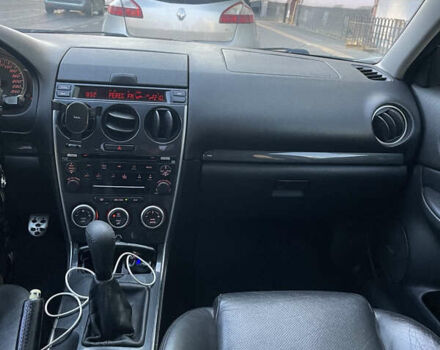 Черный Мазда 6, объемом двигателя 2.3 л и пробегом 269 тыс. км за 5300 $, фото 6 на Automoto.ua