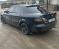 Черный Мазда 6, объемом двигателя 1.8 л и пробегом 322 тыс. км за 4000 $, фото 1 на Automoto.ua