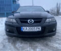 Черный Мазда 6, объемом двигателя 2.26 л и пробегом 309 тыс. км за 6700 $, фото 1 на Automoto.ua