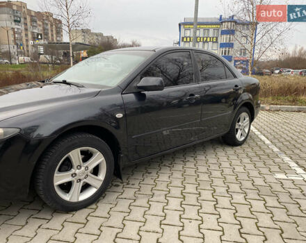 Чорний Мазда 6, об'ємом двигуна 1.8 л та пробігом 231 тис. км за 3600 $, фото 4 на Automoto.ua