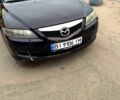 Черный Мазда 6, объемом двигателя 2 л и пробегом 250 тыс. км за 4700 $, фото 1 на Automoto.ua
