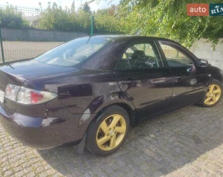 Чорний Мазда 6, об'ємом двигуна 2 л та пробігом 187 тис. км за 7000 $, фото 5 на Automoto.ua