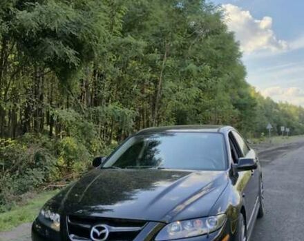 Черный Мазда 6, объемом двигателя 2.3 л и пробегом 270 тыс. км за 8000 $, фото 1 на Automoto.ua