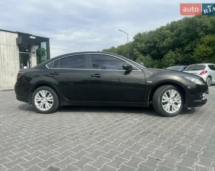Черный Мазда 6, объемом двигателя 2 л и пробегом 220 тыс. км за 7100 $, фото 1 на Automoto.ua