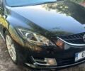 Черный Мазда 6, объемом двигателя 2 л и пробегом 226 тыс. км за 7000 $, фото 1 на Automoto.ua