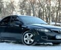 Черный Мазда 6, объемом двигателя 2 л и пробегом 322 тыс. км за 6988 $, фото 1 на Automoto.ua