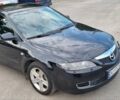Черный Мазда 6, объемом двигателя 2 л и пробегом 235 тыс. км за 5100 $, фото 1 на Automoto.ua