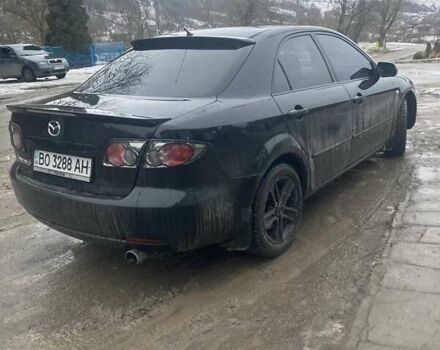 Чорний Мазда 6, об'ємом двигуна 1.8 л та пробігом 314 тис. км за 4200 $, фото 4 на Automoto.ua