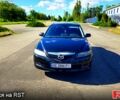 Черный Мазда 6, объемом двигателя 2 л и пробегом 220 тыс. км за 6000 $, фото 1 на Automoto.ua