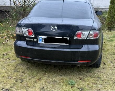 Черный Мазда 6, объемом двигателя 1.8 л и пробегом 245 тыс. км за 1650 $, фото 1 на Automoto.ua