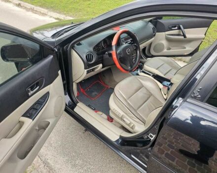 Черный Мазда 6, объемом двигателя 2 л и пробегом 310 тыс. км за 4000 $, фото 5 на Automoto.ua
