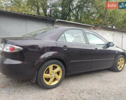 Чорний Мазда 6, об'ємом двигуна 2 л та пробігом 187 тис. км за 7000 $, фото 9 на Automoto.ua