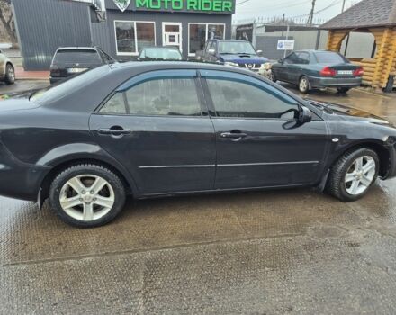 Чорний Мазда 6, об'ємом двигуна 1.8 л та пробігом 306 тис. км за 4200 $, фото 1 на Automoto.ua