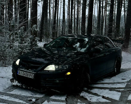 Чорний Мазда 6, об'ємом двигуна 2.3 л та пробігом 207 тис. км за 6400 $, фото 1 на Automoto.ua