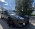 Черный Мазда 6, объемом двигателя 2 л и пробегом 290 тыс. км за 5700 $, фото 1 на Automoto.ua