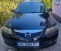 Черный Мазда 6, объемом двигателя 2 л и пробегом 215 тыс. км за 5500 $, фото 1 на Automoto.ua