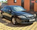 Черный Мазда 6, объемом двигателя 1.8 л и пробегом 303 тыс. км за 6000 $, фото 1 на Automoto.ua