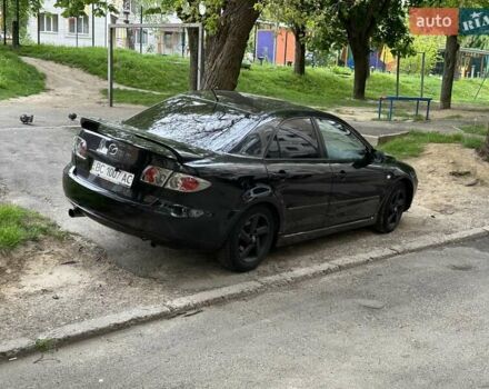 Черный Мазда 6, объемом двигателя 2.3 л и пробегом 262 тыс. км за 4700 $, фото 1 на Automoto.ua