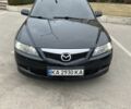 Черный Мазда 6, объемом двигателя 2 л и пробегом 243 тыс. км за 6000 $, фото 1 на Automoto.ua