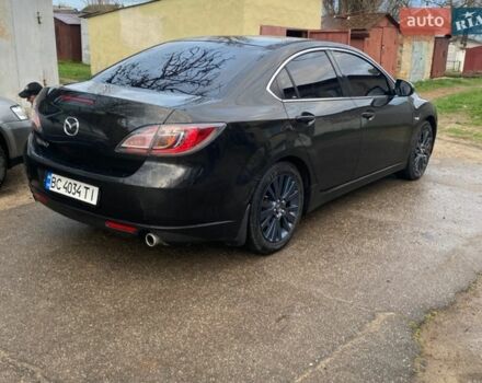Черный Мазда 6, объемом двигателя 2 л и пробегом 300 тыс. км за 5900 $, фото 2 на Automoto.ua
