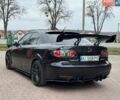 Черный Мазда 6, объемом двигателя 2.3 л и пробегом 215 тыс. км за 5700 $, фото 6 на Automoto.ua