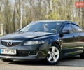 Черный Мазда 6, объемом двигателя 2 л и пробегом 314 тыс. км за 5800 $, фото 1 на Automoto.ua