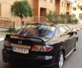 Черный Мазда 6, объемом двигателя 2 л и пробегом 210 тыс. км за 6300 $, фото 1 на Automoto.ua