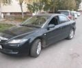 Черный Мазда 6, объемом двигателя 1.8 л и пробегом 210 тыс. км за 6500 $, фото 1 на Automoto.ua