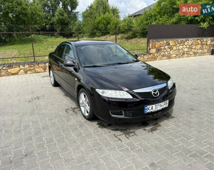 Черный Мазда 6, объемом двигателя 2 л и пробегом 221 тыс. км за 5200 $, фото 1 на Automoto.ua