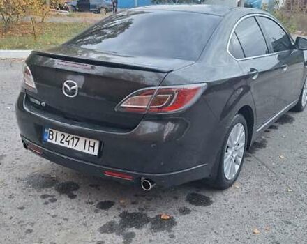Черный Мазда 6, объемом двигателя 2 л и пробегом 160 тыс. км за 6800 $, фото 4 на Automoto.ua