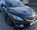 Черный Мазда 6, объемом двигателя 2 л и пробегом 99 тыс. км за 7500 $, фото 1 на Automoto.ua