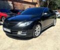 Черный Мазда 6, объемом двигателя 2.5 л и пробегом 236 тыс. км за 5600 $, фото 1 на Automoto.ua
