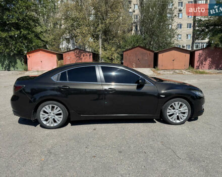 Черный Мазда 6, объемом двигателя 2.49 л и пробегом 220 тыс. км за 6700 $, фото 1 на Automoto.ua