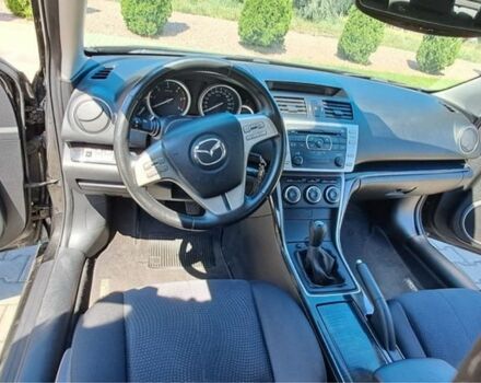 Черный Мазда 6, объемом двигателя 2 л и пробегом 140 тыс. км за 6500 $, фото 4 на Automoto.ua