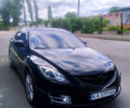 Черный Мазда 6, объемом двигателя 2 л и пробегом 307 тыс. км за 7750 $, фото 1 на Automoto.ua
