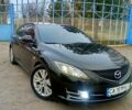 Черный Мазда 6, объемом двигателя 2 л и пробегом 300 тыс. км за 5900 $, фото 1 на Automoto.ua