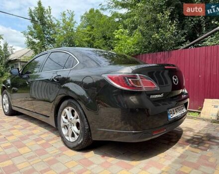 Черный Мазда 6, объемом двигателя 2 л и пробегом 350 тыс. км за 6499 $, фото 38 на Automoto.ua