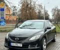 Черный Мазда 6, объемом двигателя 1.8 л и пробегом 252 тыс. км за 7000 $, фото 1 на Automoto.ua