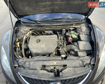 Черный Мазда 6, объемом двигателя 2 л и пробегом 180 тыс. км за 7700 $, фото 14 на Automoto.ua