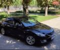 Черный Мазда 6, объемом двигателя 1.8 л и пробегом 70 тыс. км за 9300 $, фото 1 на Automoto.ua