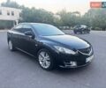 Черный Мазда 6, объемом двигателя 2 л и пробегом 239 тыс. км за 7000 $, фото 1 на Automoto.ua
