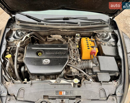 Черный Мазда 6, объемом двигателя 2 л и пробегом 258 тыс. км за 6900 $, фото 10 на Automoto.ua