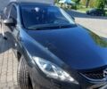 Черный Мазда 6, объемом двигателя 1.8 л и пробегом 283 тыс. км за 6000 $, фото 1 на Automoto.ua