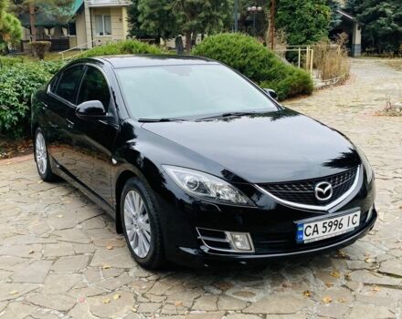 Черный Мазда 6, объемом двигателя 2 л и пробегом 266 тыс. км за 6600 $, фото 1 на Automoto.ua