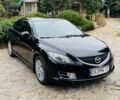 Черный Мазда 6, объемом двигателя 2 л и пробегом 266 тыс. км за 6600 $, фото 1 на Automoto.ua